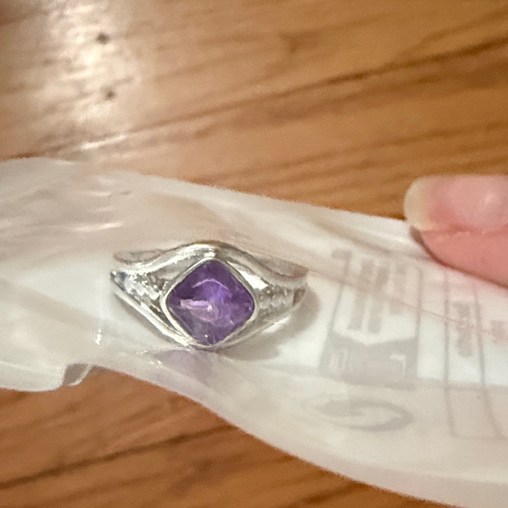 Sterling Silver Ring with Purple Gemstone size 6.
